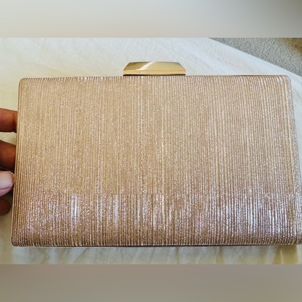Golden metallic bag with slight hints of silver